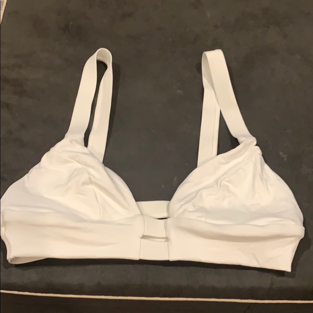White Vitamin A swim top. No pads and Never worn.